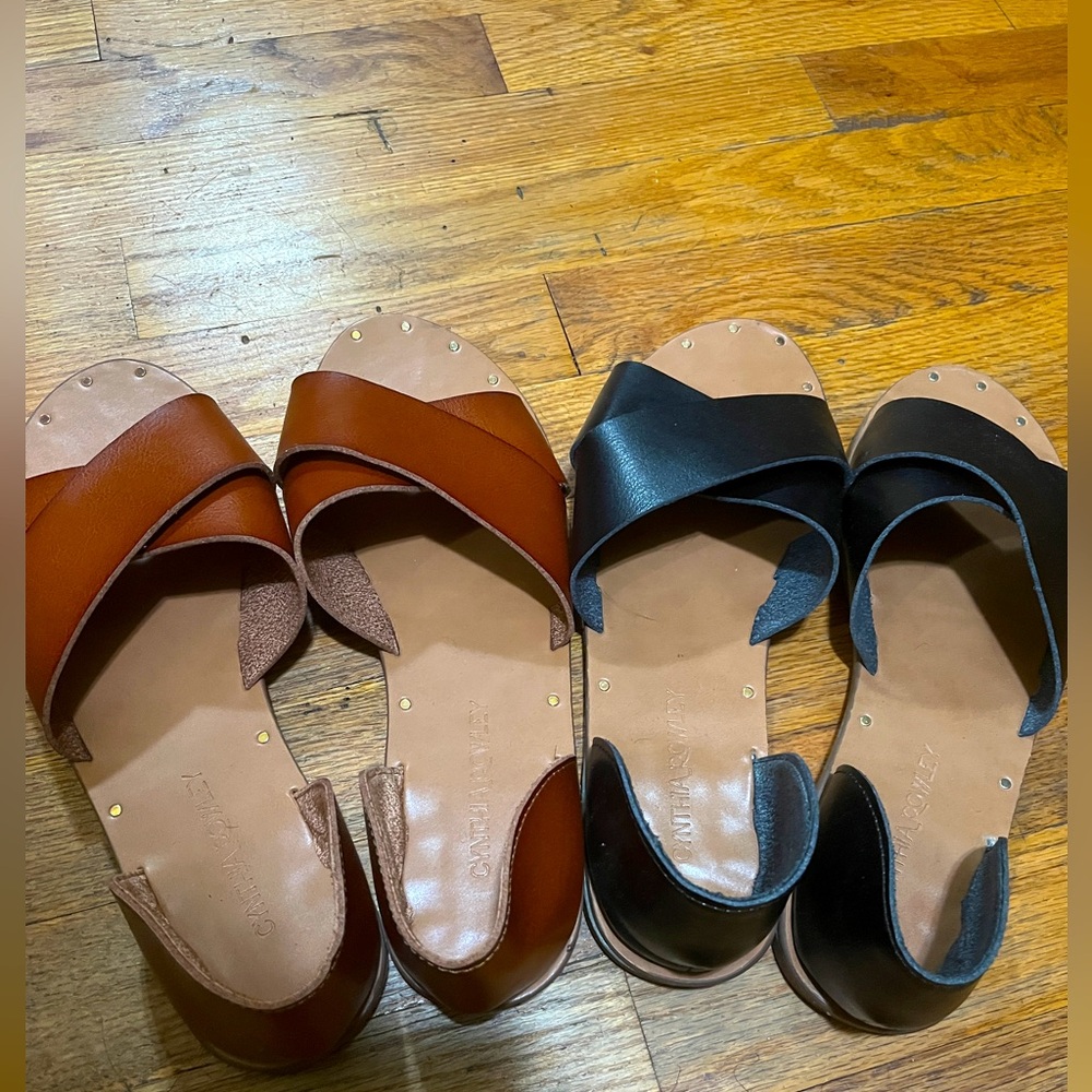 Women’s size 10 slide in sandals. 2 pairs
